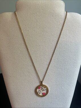 Gold-Tone Pendant Necklace with Pink Heart and White Flower Accents